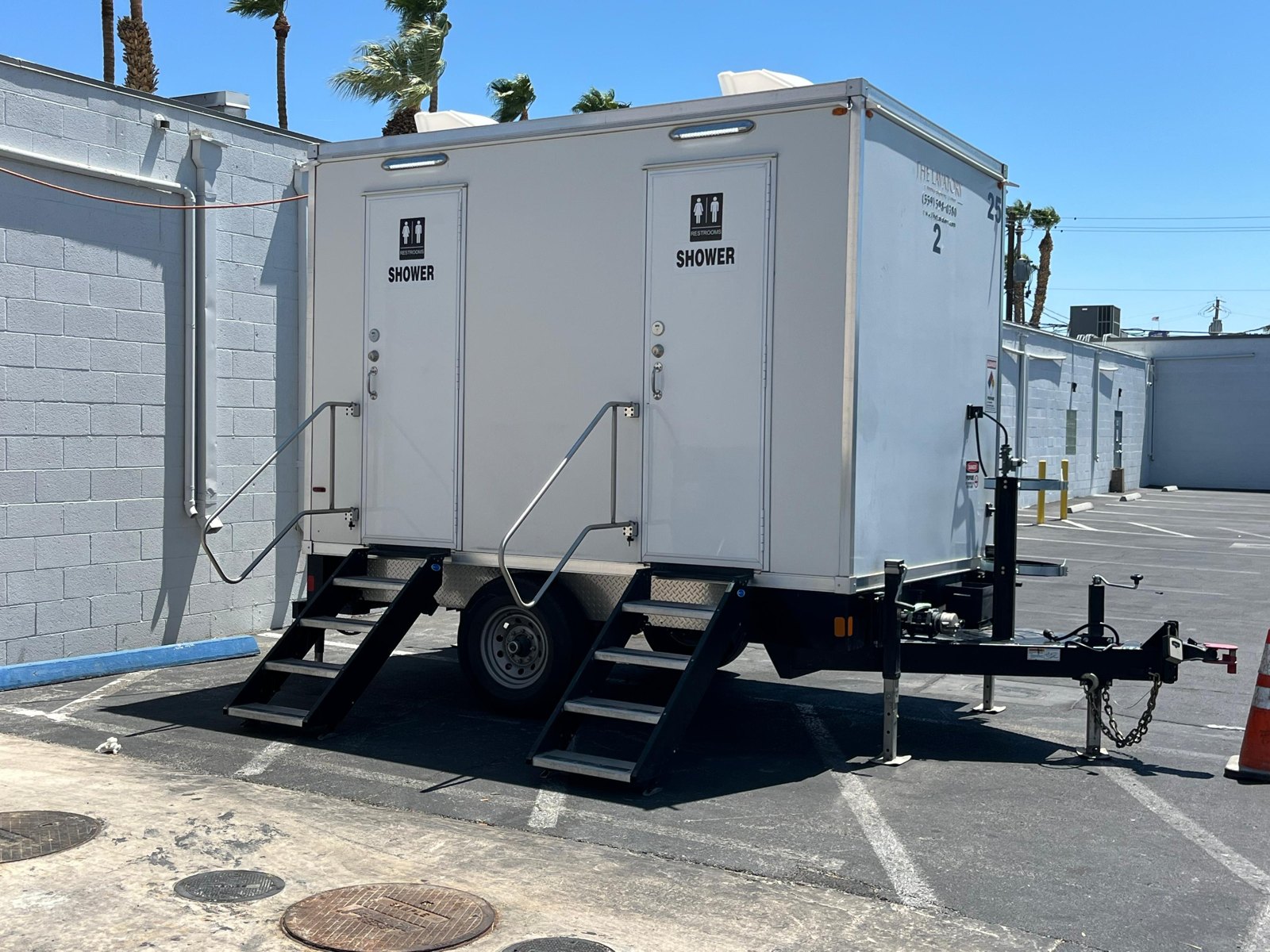 Work crew using a multi stall shower trailer at the end of a shift on a Nevada jobsite